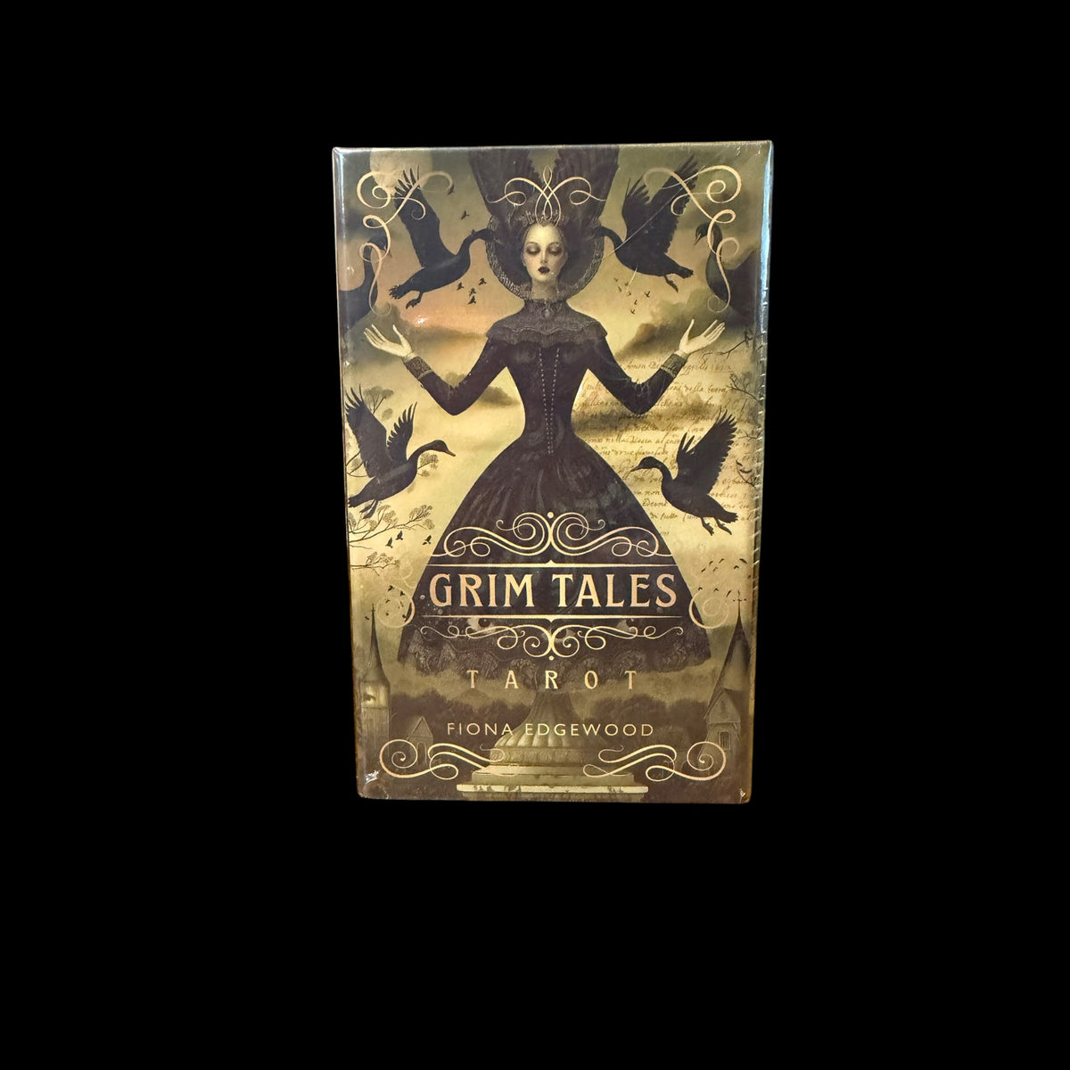 Grim Tales Tarot deck box featuring a dark gothic woman with ravens by Fiona Edgewood
